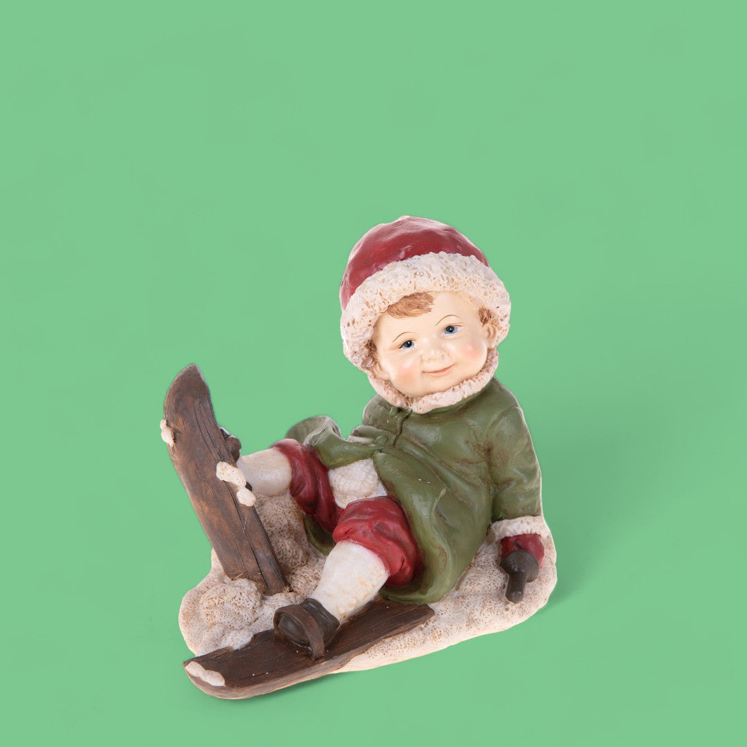 Bimbo Seduto con Sci • 12,5 cm