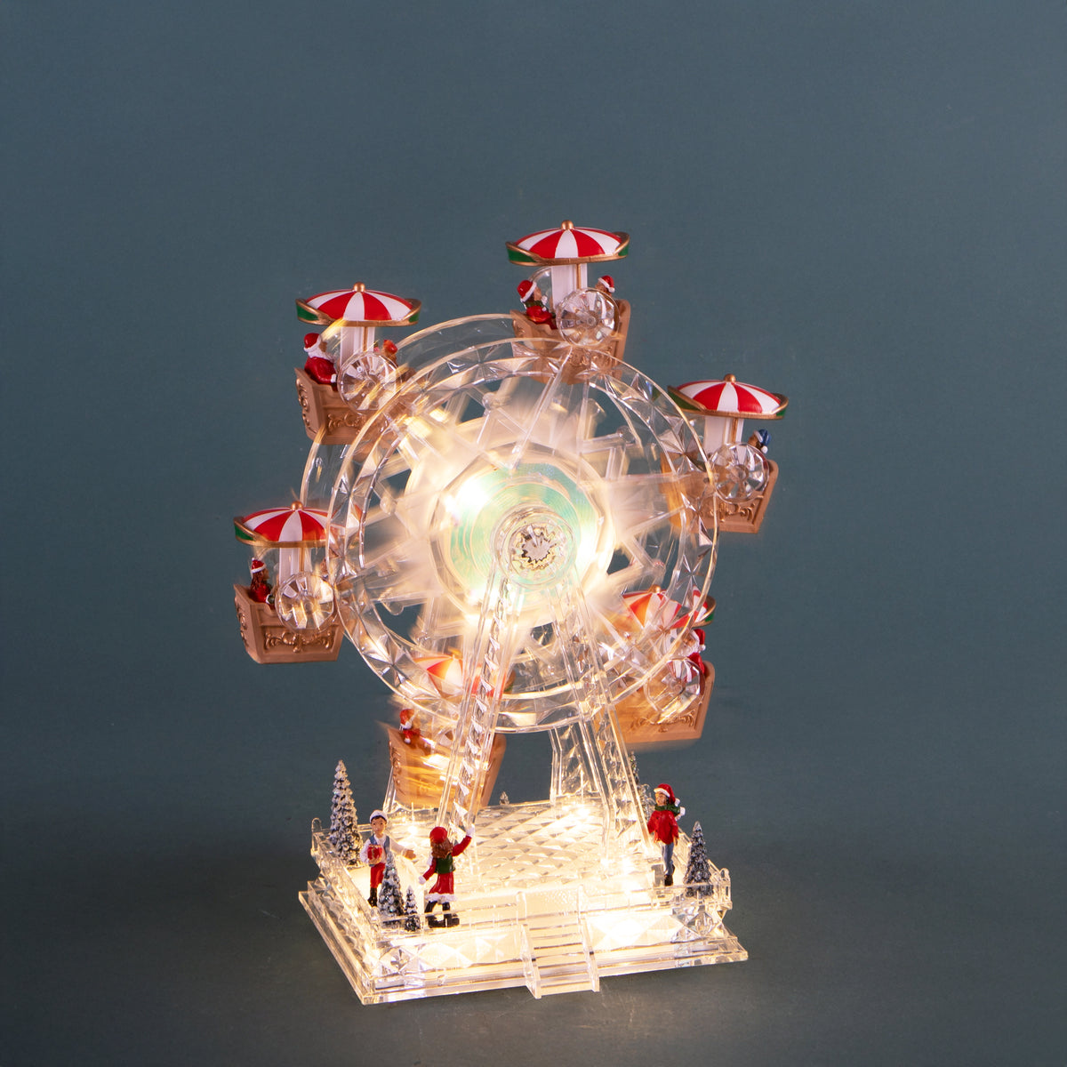 Giostra 20xh28 cm con santa led+musica int. • H 28 cm