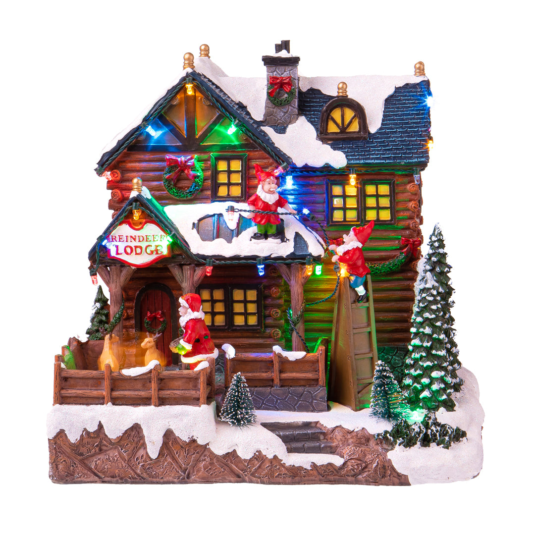 Baita mov+mus+luci con santa e elf • H 25 cm