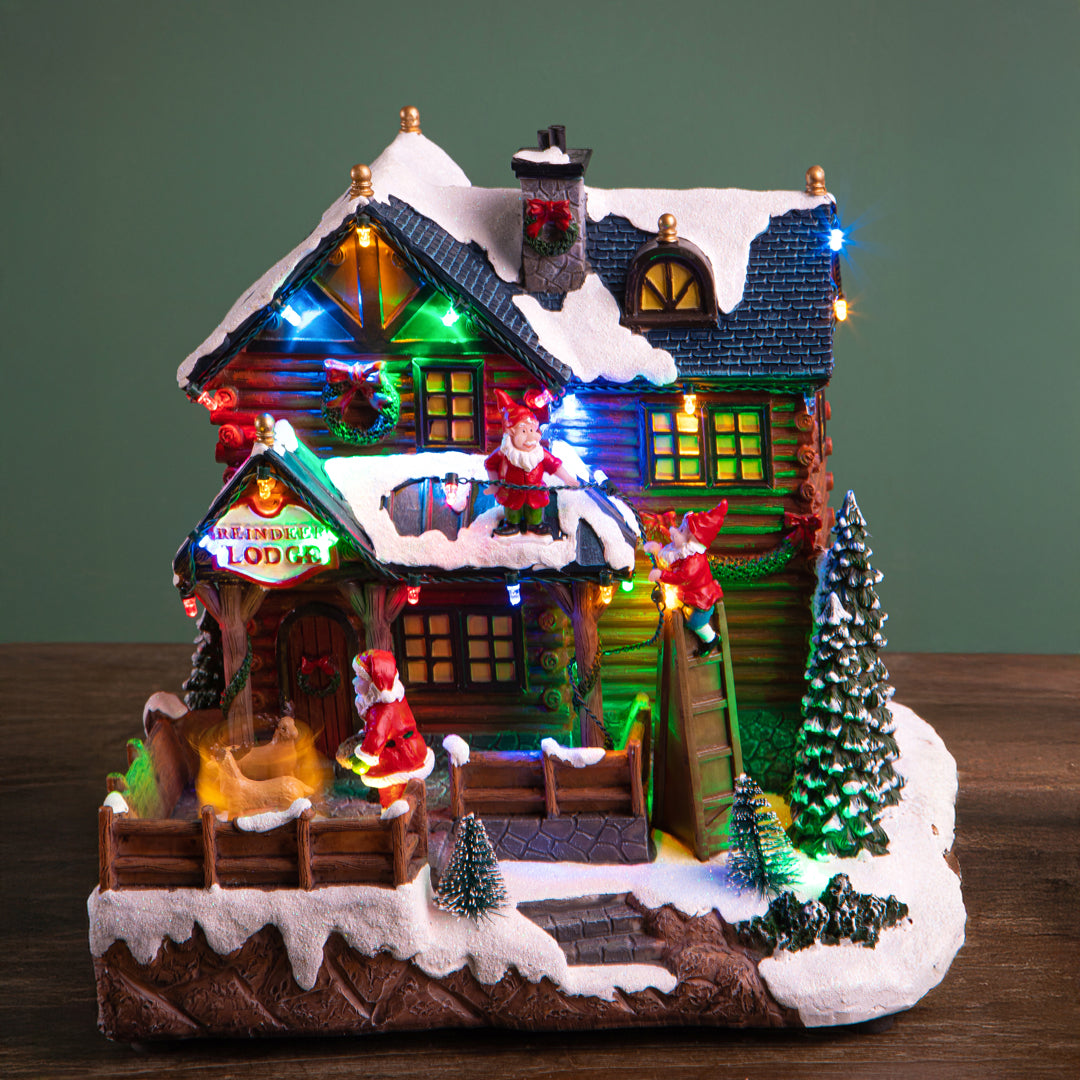 Casa Babbo natale luci movimento e musica • 25,5 cm