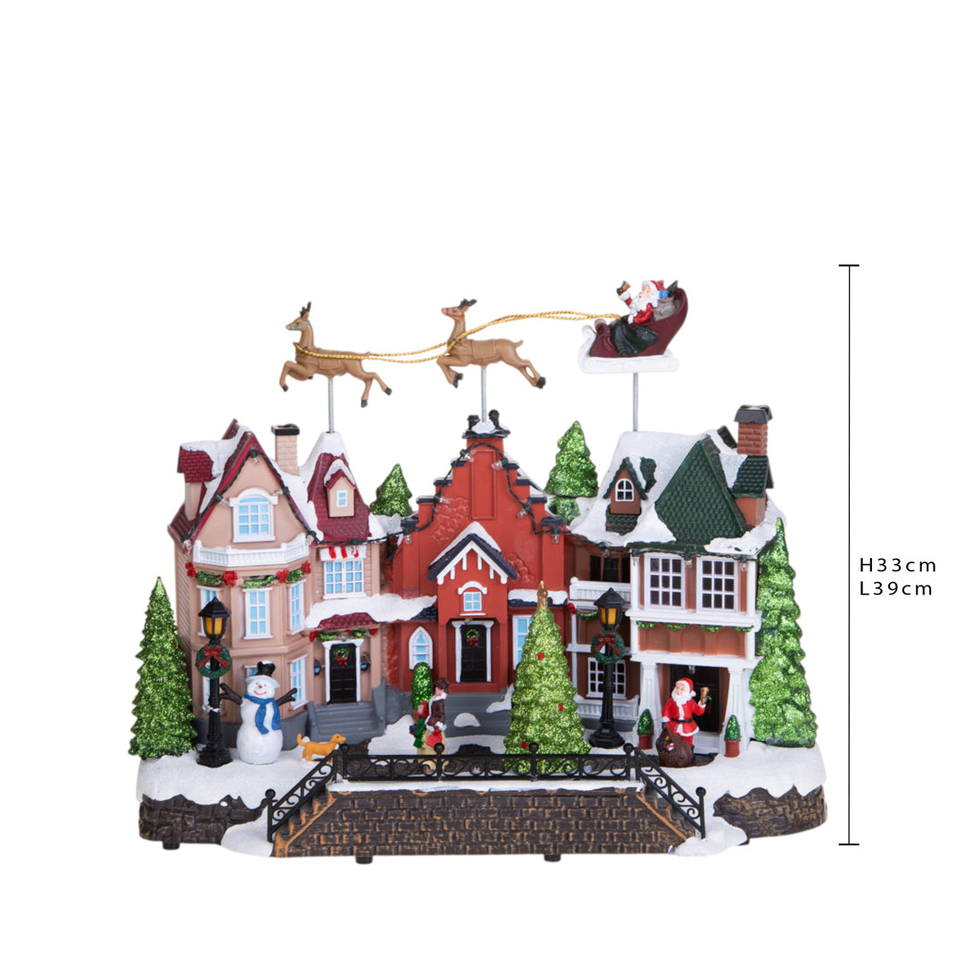 Villaggio con Slitta Mov+Luci+Mus • 33 cm