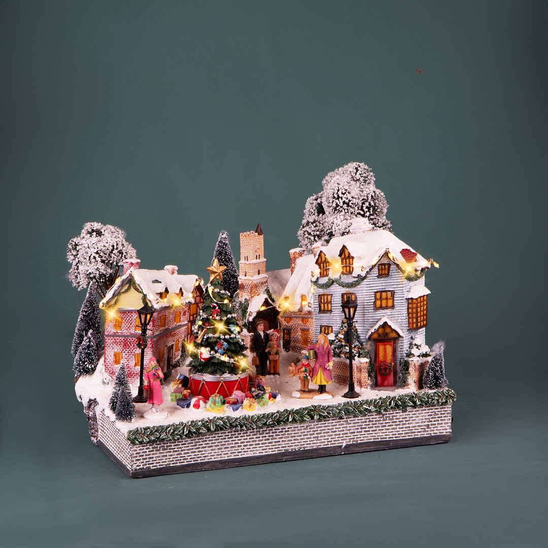 Villaggio natalizio doni movimento musica e luci • 35 cm