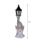 Angelo con lampione con led • H 21 cm