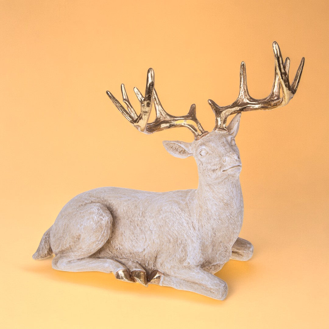 Renna seduta • H 38,7 cm