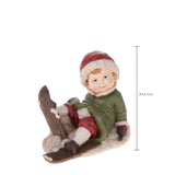 Bimbo Seduto con Sci  • 12,5 cm