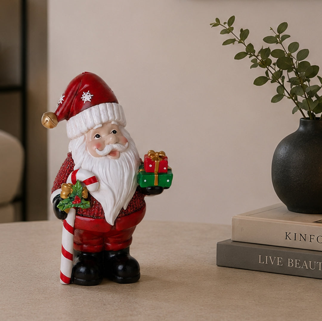 Babbo natale con pacco dono • H 18,5 cm