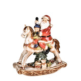 Babbo natale porcellana su cavallo • 25 cm