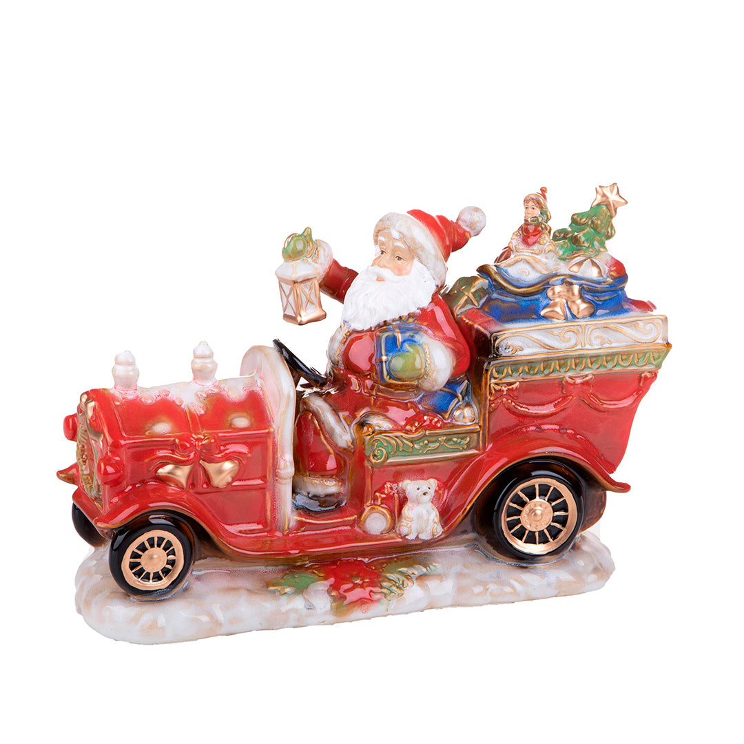 Babbo natale su auto con doni • 34 cm