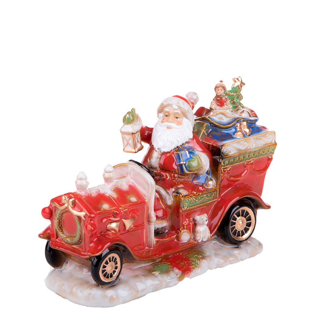 Babbo natale su auto con doni • 34 cm