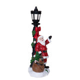 Babbo nat. con lampione led • H 38 cm