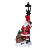Babbo nat. con lampione led • H 38 cm