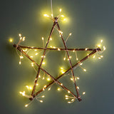 Stella legno con led da int. • H 35 cm