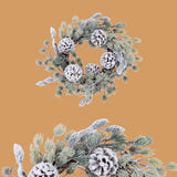 Corona con pigne e neve • H 12 cm