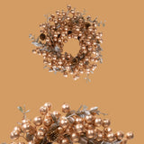 Corona con mini pigne e foglie • H 12 cm