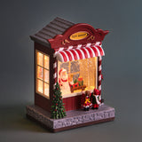 Toy shop con santa led+mus • H 22,5 cm