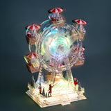 Giostra 20xh28 cm con santa led+musica int. • H 28 cm