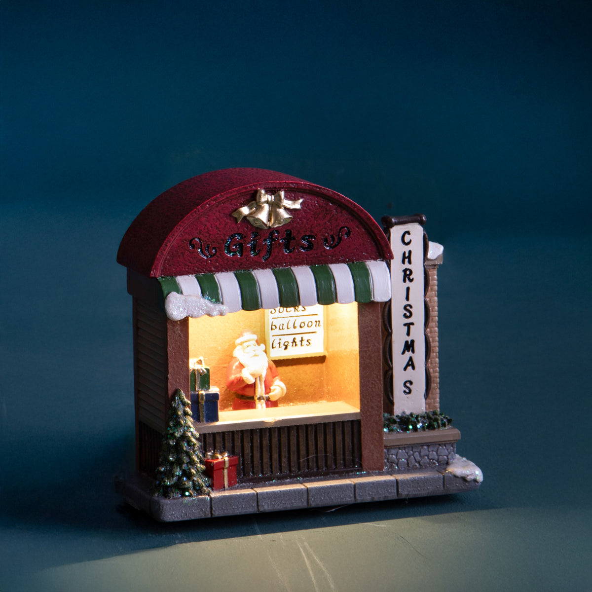 Negozio 13xh12. con babbo natale+led • H 12,5 cm